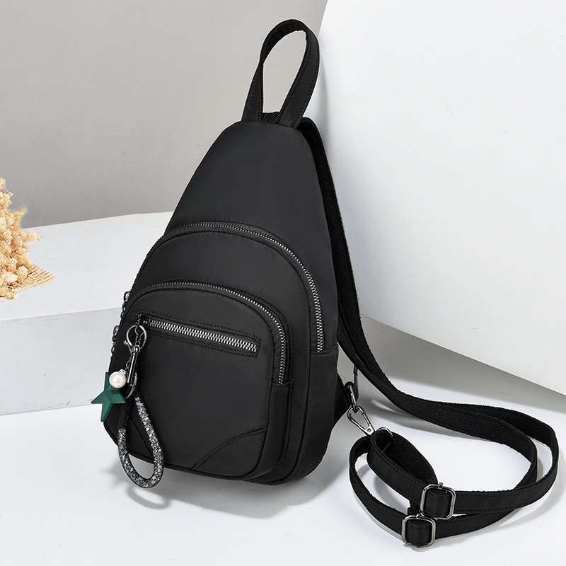 Fabricantes de bolsos de pecho de tela Oxford para mujer nueva mochila de mensajero para mujer de mediana edad, mochila de viaje, bags de gran capacidad de doble uso