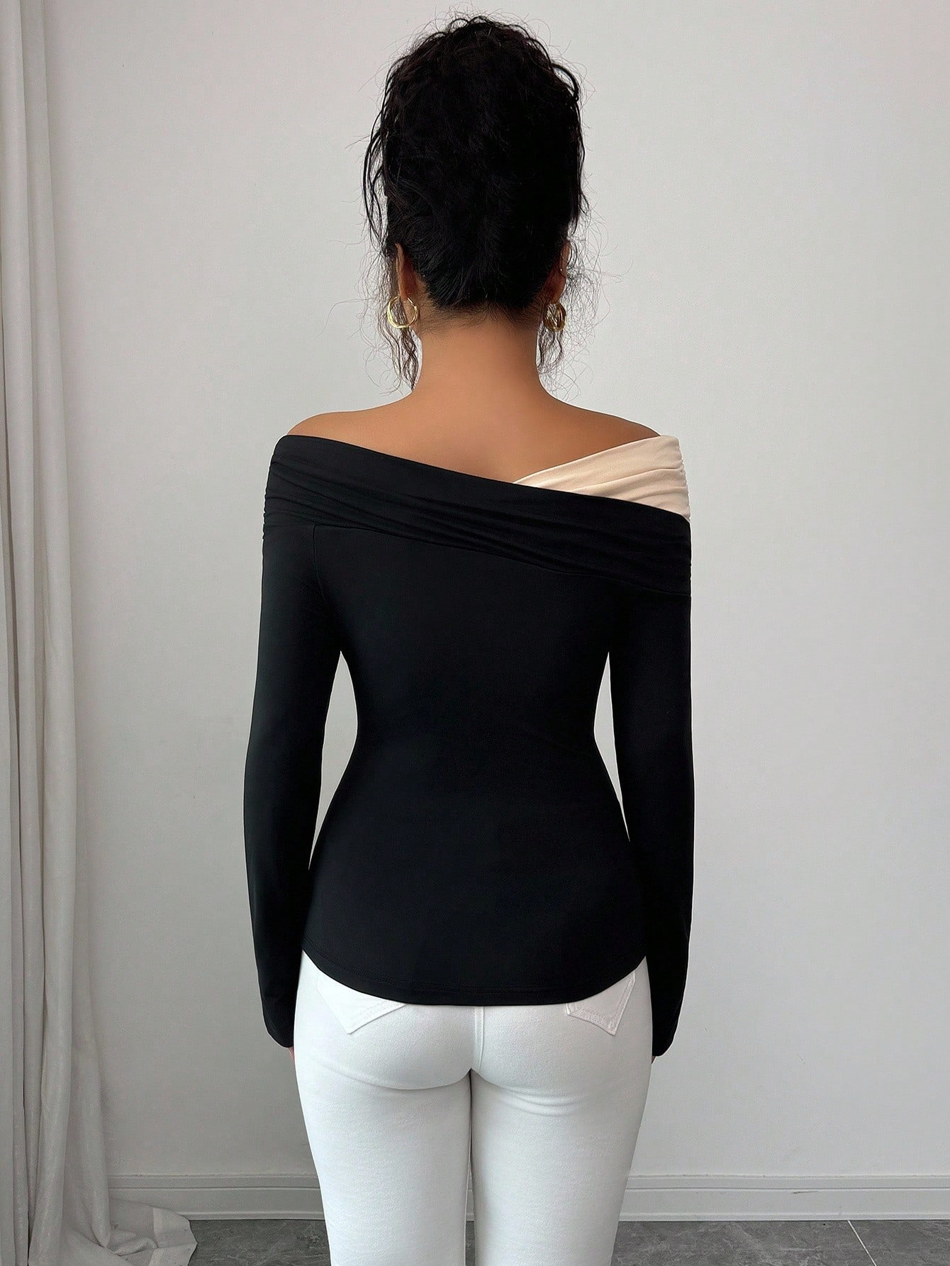 Europa y los Estados Unidos transfronterizos Amazon otoño y invierno 2026 nuevo color de contraste un cuello irregular plegado borde delgado chaqueta larga