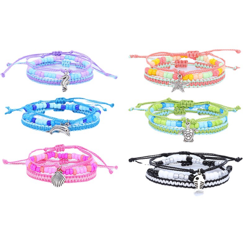 Bohemian style summer new cross-border marine tie-in hand rope starfish turtle dolphin pendant rice bead set bracelet