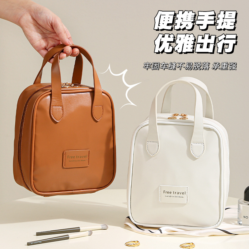 Nueva bolsa de maquillaje de viaje PU para mujeres productos de cuidado de la piel bolsa de maquillaje de almacenamiento de gran capacidad portátil bolsa de maquillaje portátil