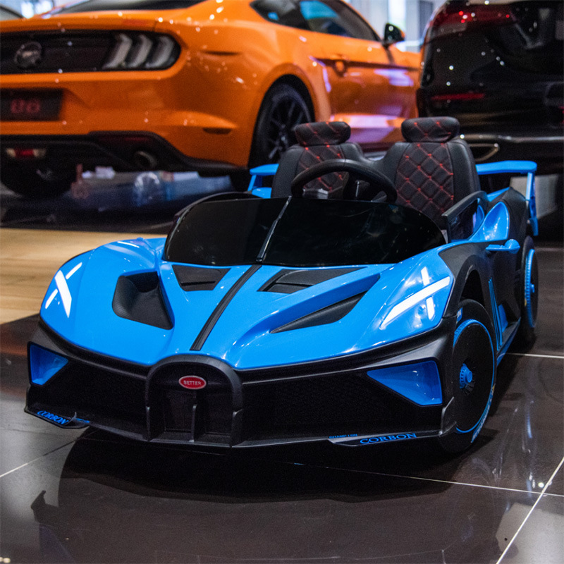 Coche eléctrico para niños coche de control remoto sentado bebé coche deportivo de cuatro ruedas entrega de una pieza coche de juguete recargable