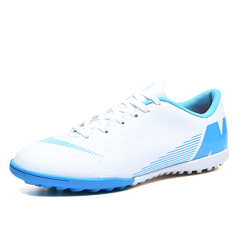 2025 nuevos clavos transfronterizos para hombres y mujeres zapatos de entrenamiento transpirables zapatos de fútbol fábrica de zapatos