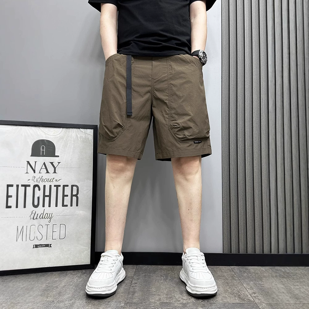 Летние мужские карго-шорты 2025 года с большими карманами, свободного кроя, дышащие пляжные шорты для молодых мужчин, оптовая доставка.