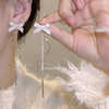 Asymmetrical earrings with tassels, diamond encrusted, simple and elegant design, light luxury style