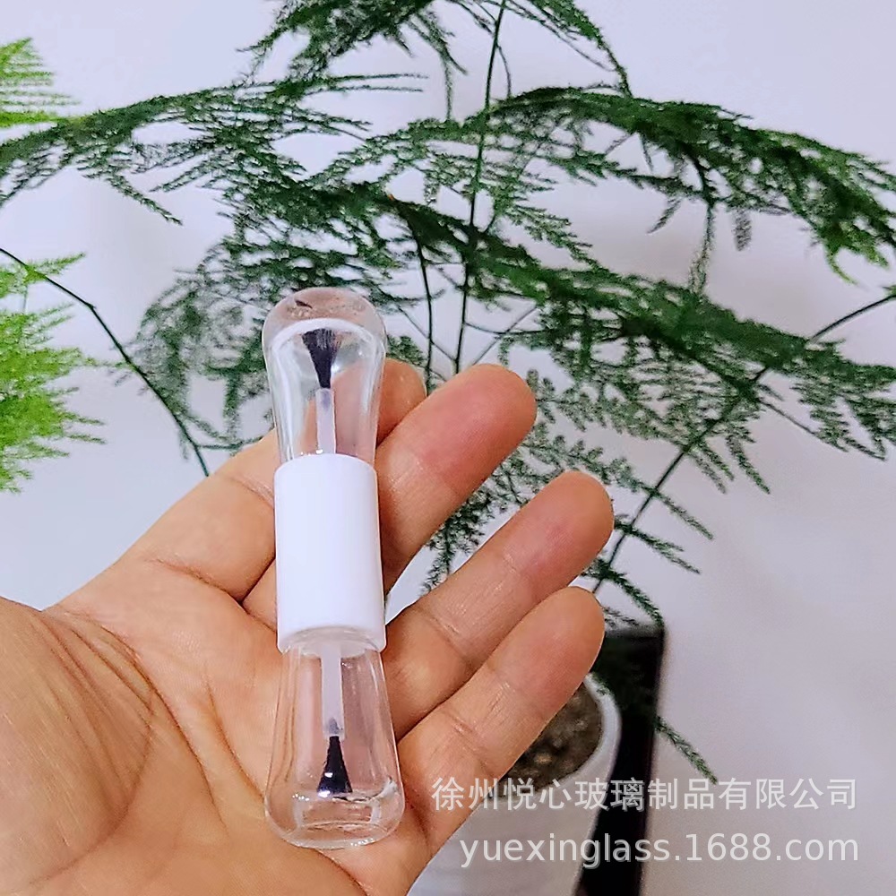 Botella de esmalte de uñas de dos cabezas Botella de pegamento para colorear productos para el cuidado de la piel Botella de maquillaje de subempaque Botella de brillo de labios portátil líquido de diferentes propiedades