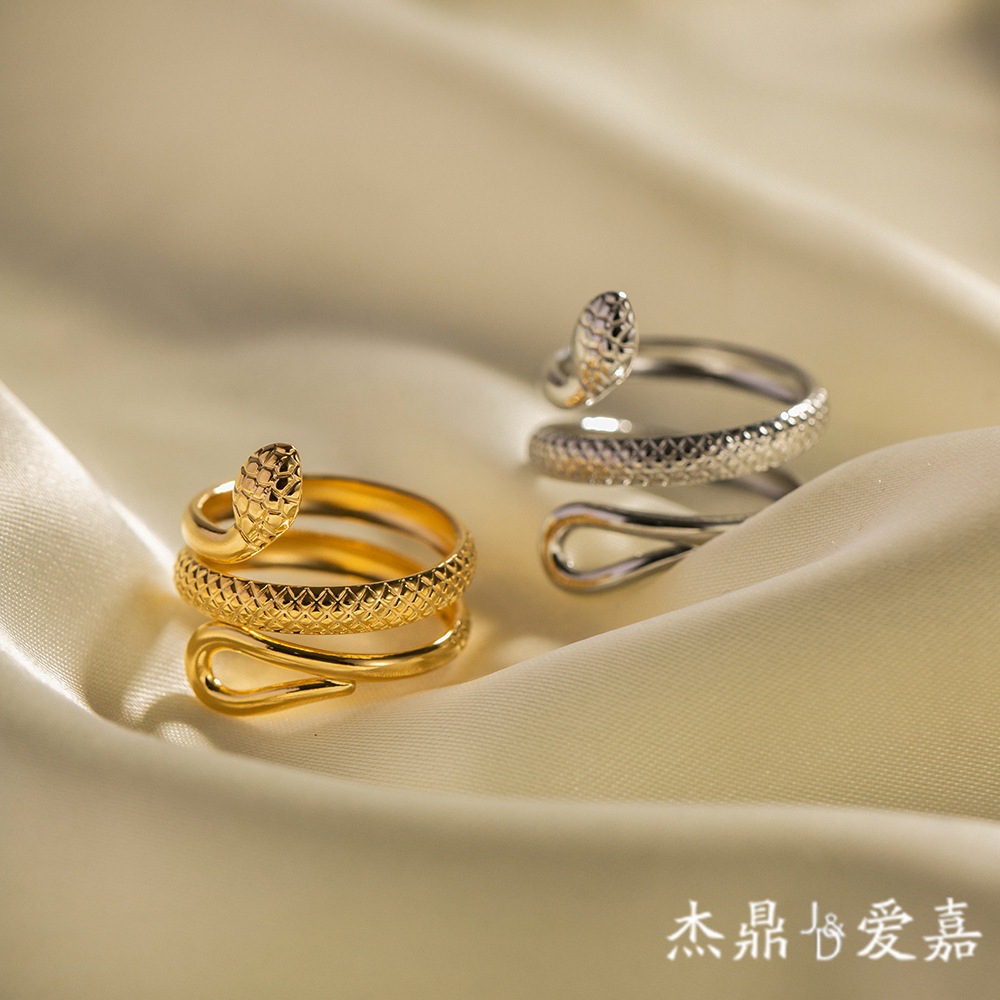 18K chapado en oro de acero inoxidable clásico textura serpiente diseño hueco anillo ajustable para mujeres moda titanio anillo de acero