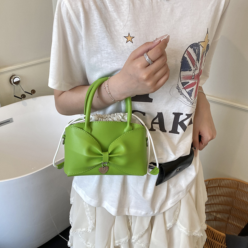 Bolso de moda coreano 2025 verano nuevo bolso femenino diseño de nicho bolso de hombro lindo lazo bolso de mensajero