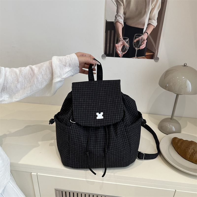 Mochila de gran capacidad con cordón de moda 2025 verano nuevo estilo salvaje ins bolso casual mochila escolar popular de este año
