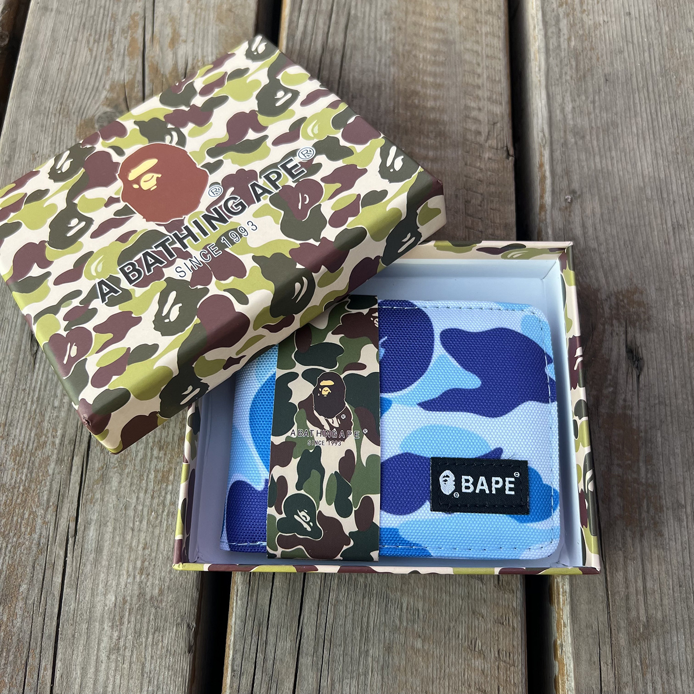 Short human head, camouflage box