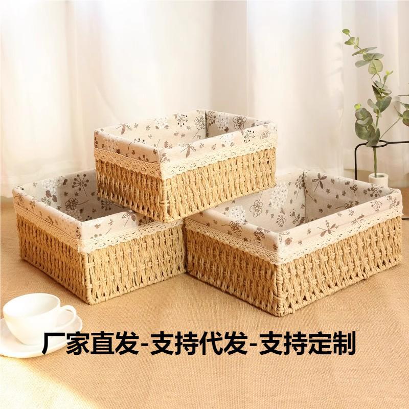 収納かごは草編みのデスクトップの間食収納かごの家庭用編みをまねて、籐編みのおもちゃ収納ケースを制定することができます。