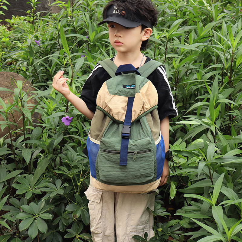 Bolso de viaje simple y casual de gran capacidad 2025 nueva mochila para estudiantes con cordón Mochila para niños de moda coreana