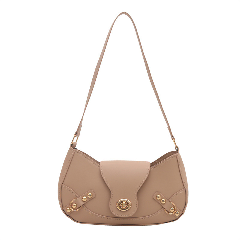 Bolsa de bolinillos retro chica caliente un hombro bolso de mochila para mujeres 2025 nuevo diseño locomotora de cierre de viento bolso de brazo