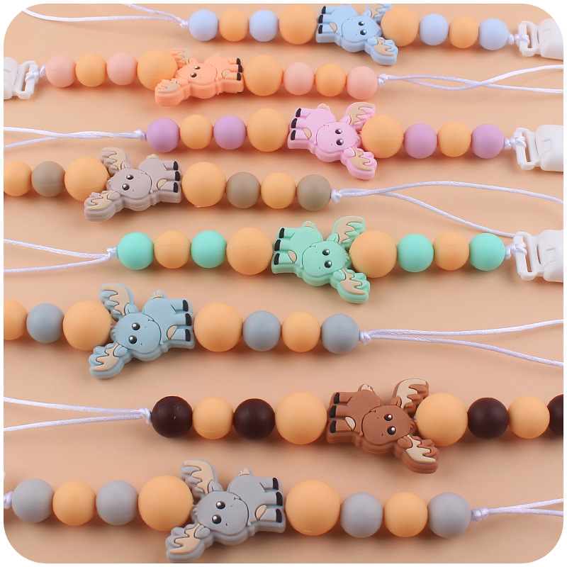 Nuevos suministros para bebés chupete cadena creativa bebé alce de silicona bebé mordedura molar anti-caída de la cadena