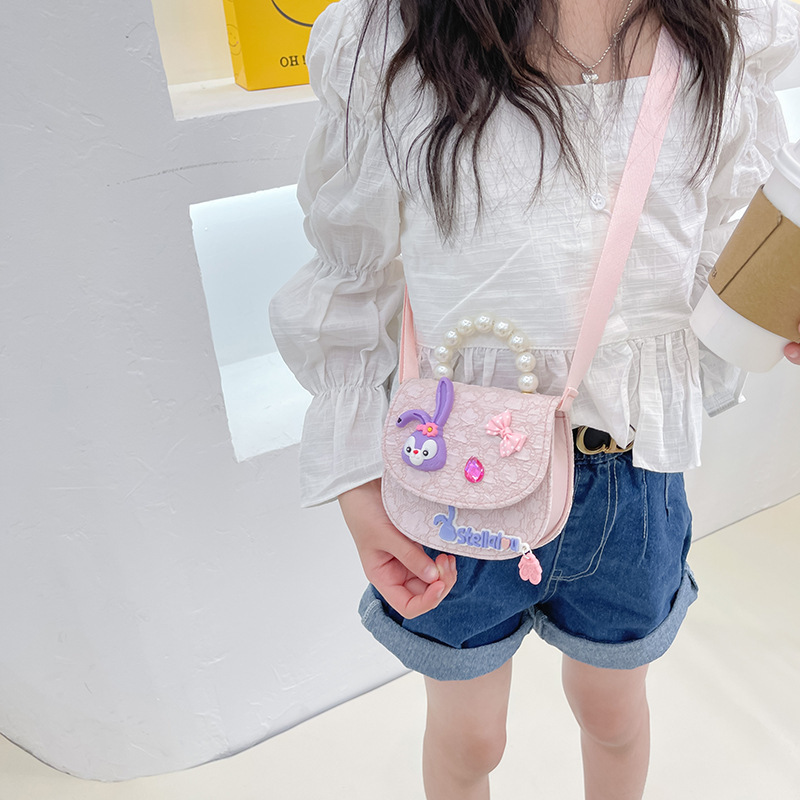 Bolso de los niños al por mayor bolsa de mensajero de las niñas bolso de perlas de moda de dibujos animados accesorios bolsa estrella Delu mochila