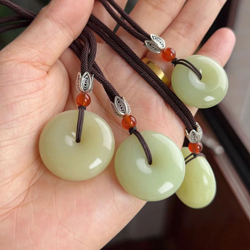 Natural jade peace buckle Hetian jade button pendant Xiuyan tremolite yellow and white old jade peace buckle pendant wholesale