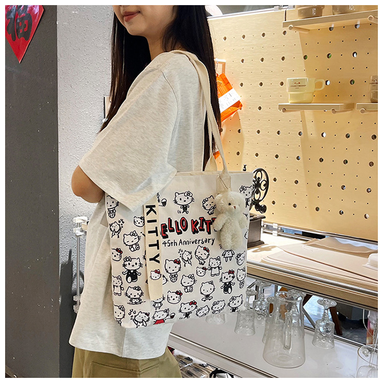The new fashionable cartoon canvas bag, simple and versatile tote bag, cute commuting single-shoulder tote large bag, is selling well across borders undefined