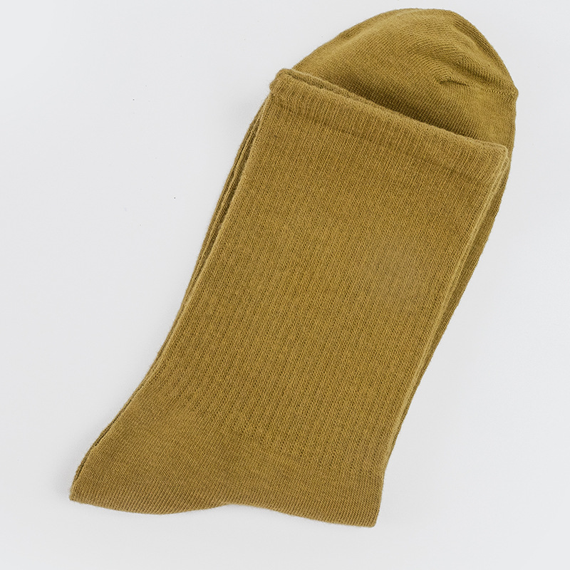 Calcetines de mujer para primavera y otoño, calcetines de algodón de color liso, versátiles y a la moda, calcetines holgados, calcetines de longitud media, calcetines deportivos que absorben el sudor, venta al por mayor.