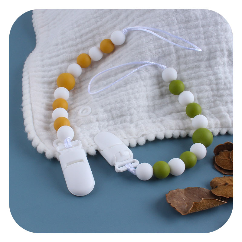 Nuevos suministros para bebés clip de pico de pato de plástico cuentas de silicona mordedor bebé juguetes molares chupete cadena anti-caída cadena