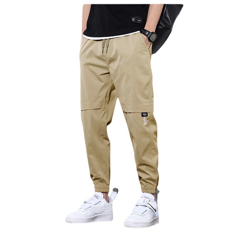 Ropa de trabajo de primavera y otoño pantalones largos pantalones casuales de los hombres pantalones sueltos atados al tobillo marca de moda de primavera y verano Pantalones deportivos delgados