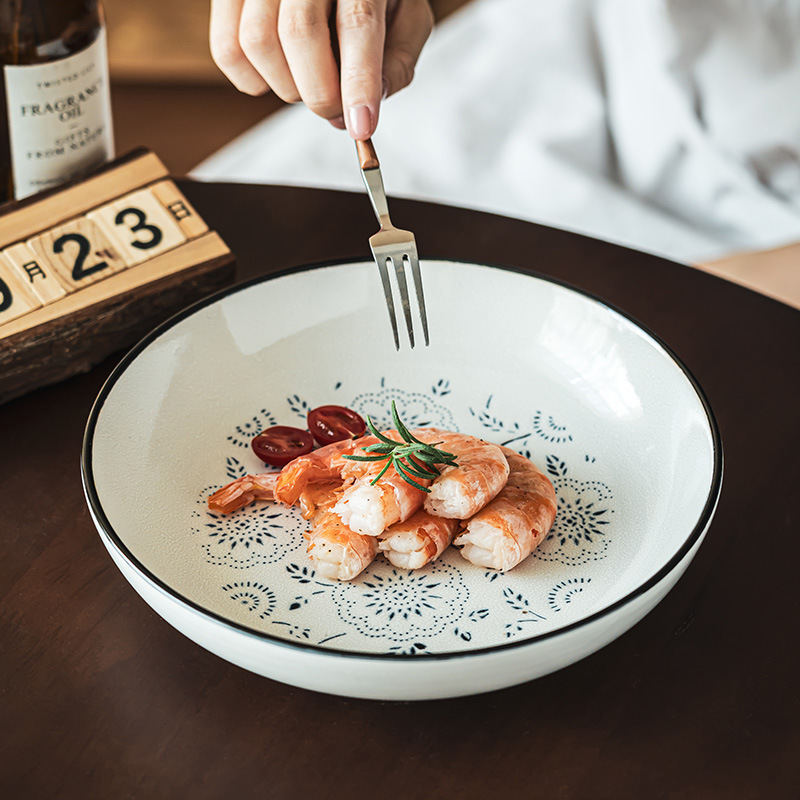 Tacos de cerámica de impresión creativa de alto valor de cara, cubiertos caseros, tazones poco profundos, tazones prácticos, tazones de ensalada, tazones de pasta, tazones de comida occidental