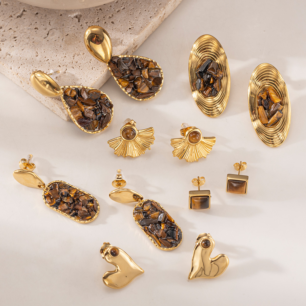 Taina europa y americana pendientes de acero inoxidable lujo ligero de alto nivel sensación de piedra triturada natural pendientes al por mayor joyería transfronteriza nicho