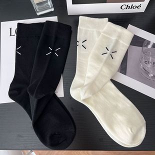 Autumn and Winter new online celebrity same black and white socks women's mid-calf length socks simple Japanese style niche designer bottoming stockings