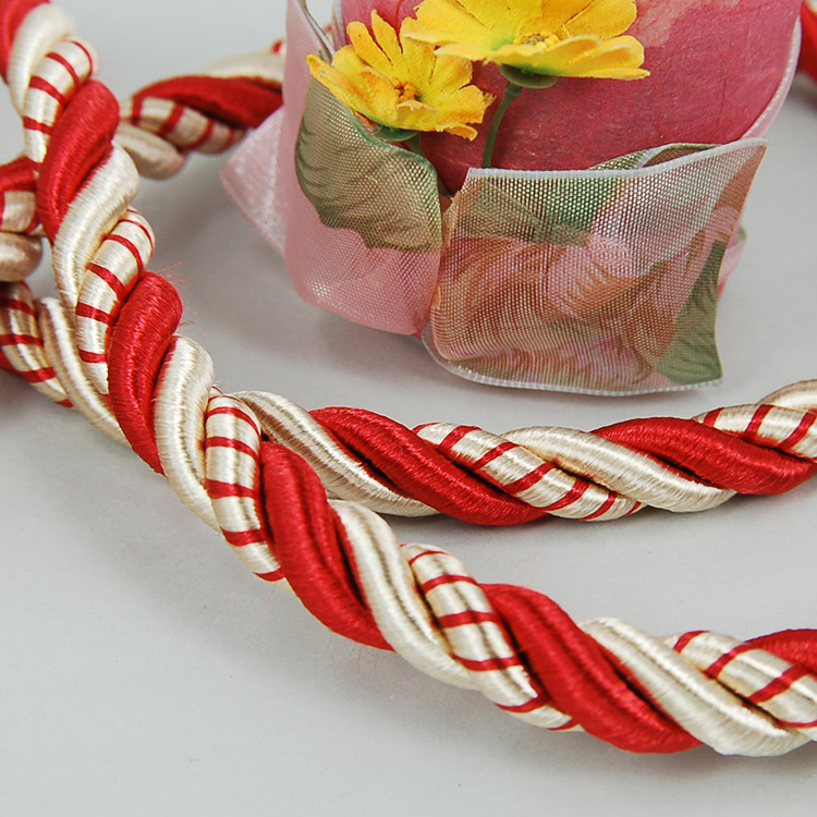 厂家供应12ＭＭ直径三股涤纶光丝扭绳、酒盒手挽绳、手提绳