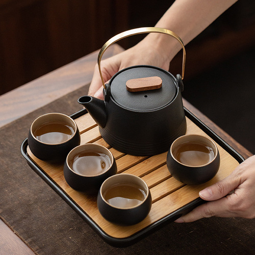 Japanese black pottery tea set with beam, one pot, four cups, tea tray, office home tea set gift box with custom logo