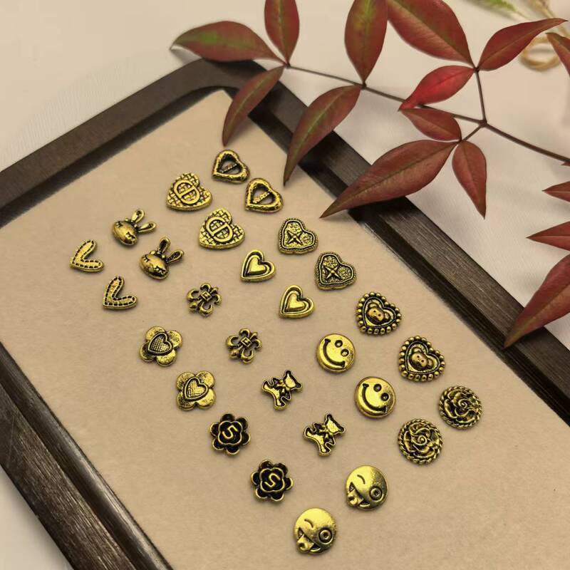 Net red explosions retro old alloy love jewelry three-dimensional ancient gold DIY smiling face nail jewelry wholesale