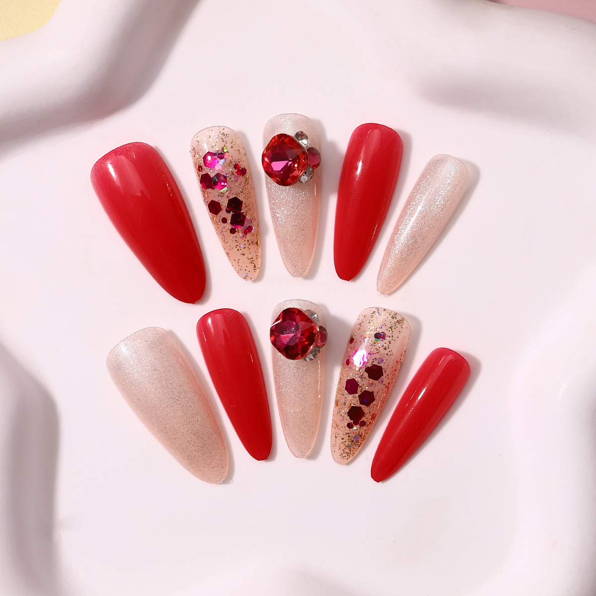 Manicura portátil, sensación de alta calidad, uñas, uñas, brillo de color fruta del dragón, uñas postizas largas de flores de almendra al por mayor