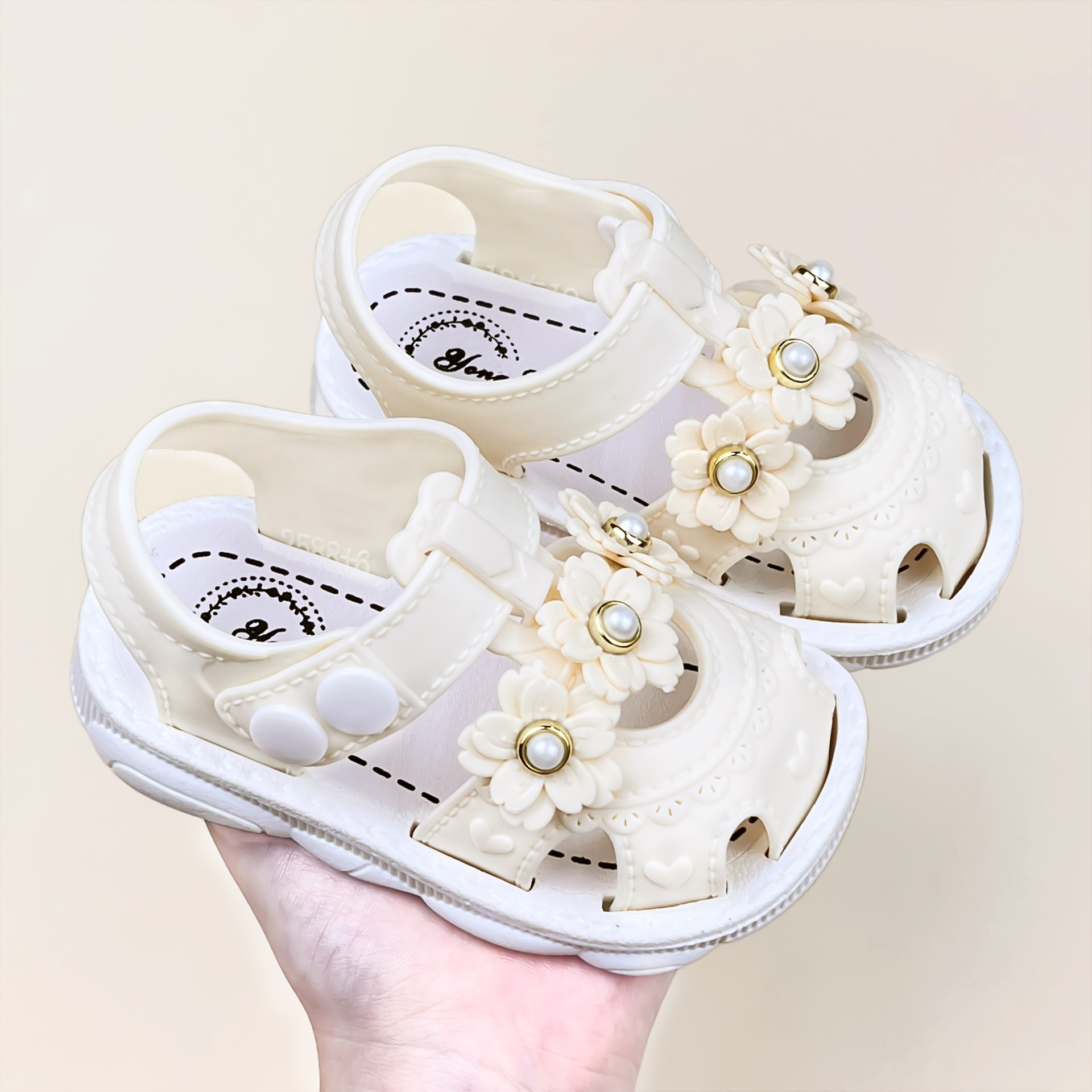 Niñas de verano nuevo zapato de bebé princesa etiquetado personalizado suave antideslizante sandalias bebés al por mayor