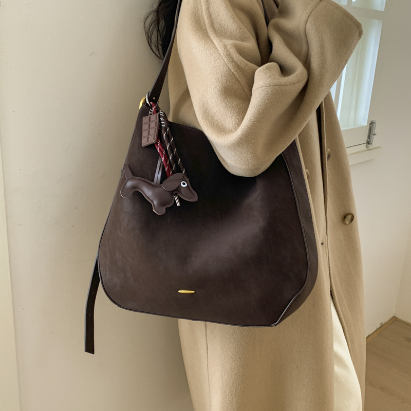 BENL alta sensación de bolso de invierno para mujeres 2025, nuevo tipo de gran capacidad, bolso de cubo de transporte, bolso de hombro de viaje