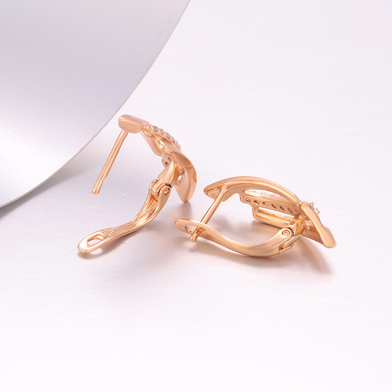 Aretes tipo hebilla de hoja 18K de aleación de cobre para mujer