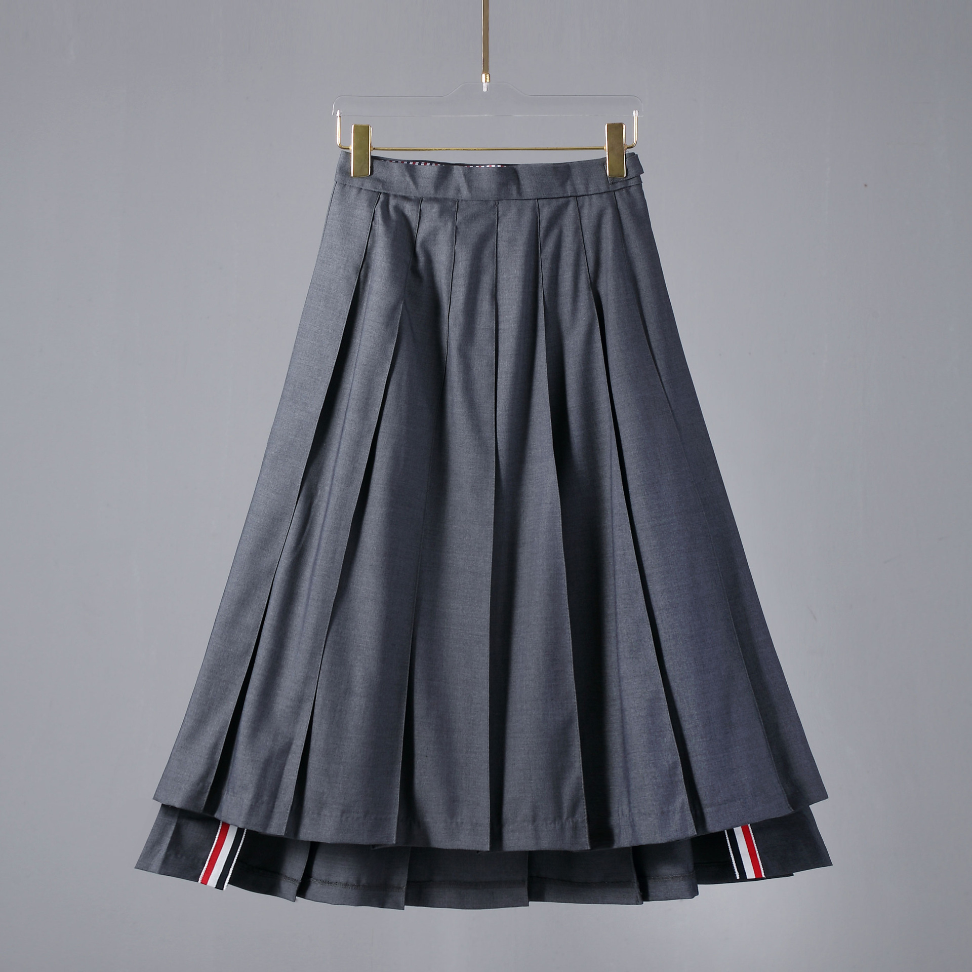 スポットTB JLプリーツスカート ハイウエスト 痩身 4本ストライプ アシンメトリーロングスカート Aライン 万能四季ハーフレングススカート レディース
