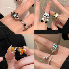 猫の目の石の星の指輪の女性のinsの潮のファッションの個性のカップルの食事の指の指輪の小さい大衆の気質の百合の指の輪