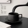Polka dot ceramic coffee cup and saucer-black