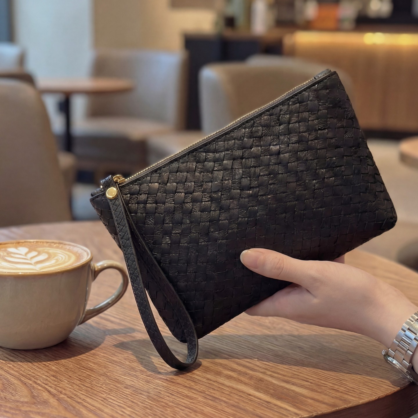 2026 nueva tendencia tejida bolso de mano blando color sólido bolso de mano de alta sensación bolso de teléfono móvil sobre de almacenamiento bolso pequeño