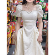茶歇法式白色泡泡袖连衣裙仙女夏季气质高级感收腰在逃公主长裙子