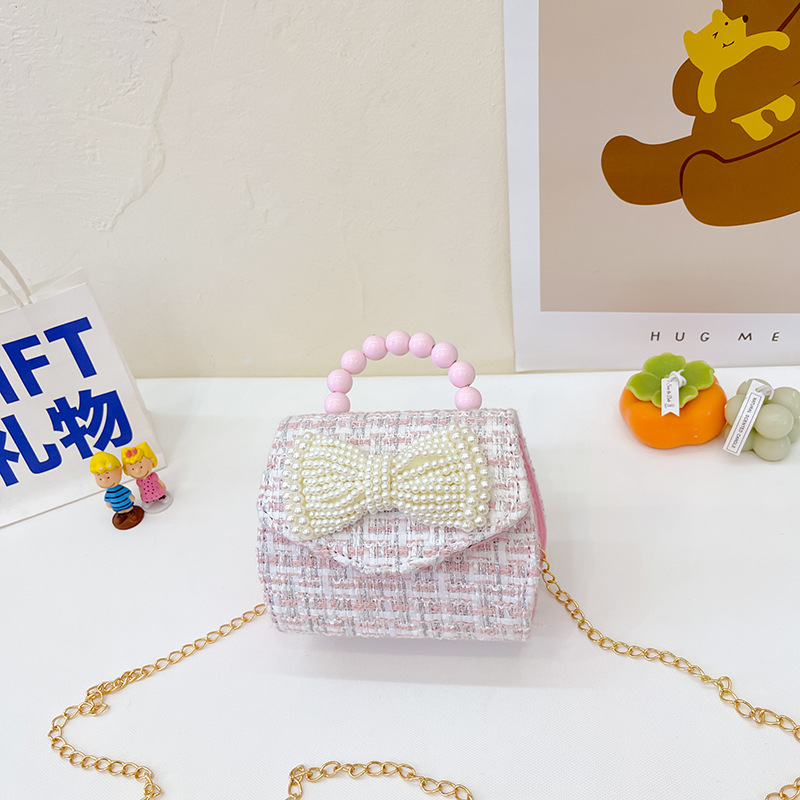 2022 nuevo arco de la celebridad en línea tejida bolso de los niños de las mujeres de estilo coreano lindo crossbody mini bolso de la perla