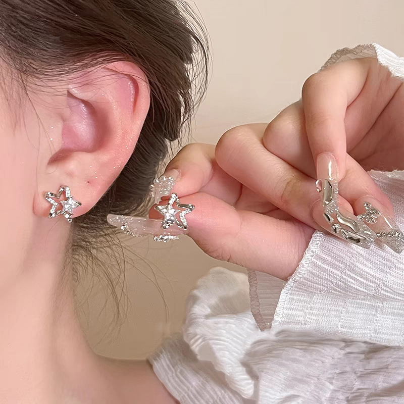 Pendientes de aleación Pendientes de alta calidad de perlas para mujer Pendientes exagerados de temperamento de lujo ligero coreano Pendientes largos con borlas al por mayor