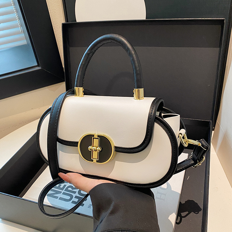 Bolso de diseño de nicho de textura 2024 invierno nuevo bolso de mujer moda manzana bloqueo mochila bolso de mano de estilo occidental