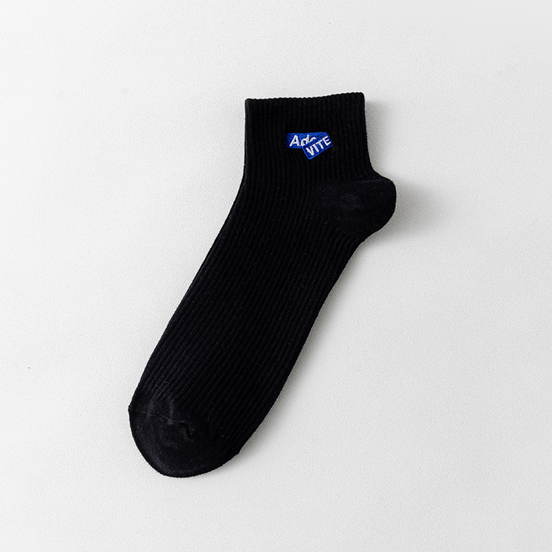 Algodón de color sólido primavera y verano unidireccional botón calcetines bordados letras rayas absorben sudor en el deporte de tendencia