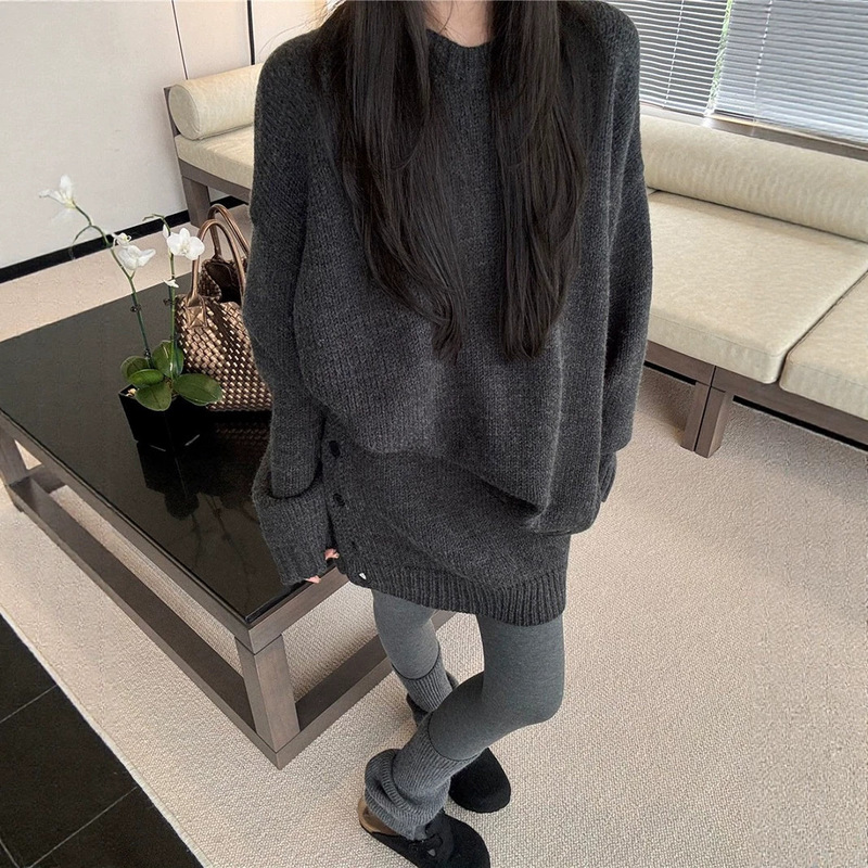 Cross-border minimalist and relaxed knit set for women, featuring a round-neck casual knit sweater and a slimming, figure-hugging midi skirt, sold as a two-piece outfit Cross-border minimalist and relaxed knit set for women, featuring a round-neck casual knit sweater and a slimming, figure-hugging midi skirt, sold as a two-piece outfit