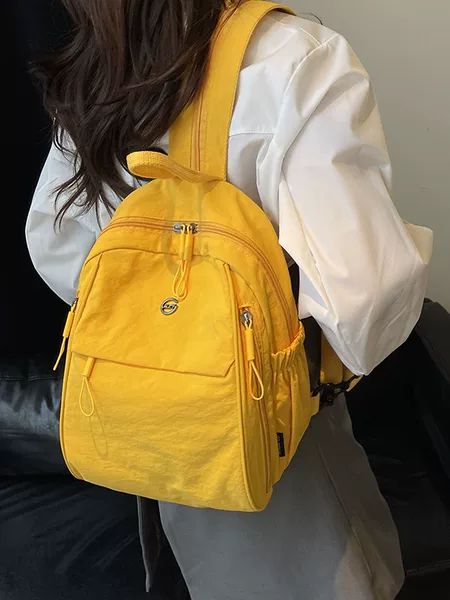 Cross-Border Manufacturer Direct Sales Waterproof Nylon Couple Backpack Casual Travel Bag Boarding Bag Large Capacity and Good Appearance