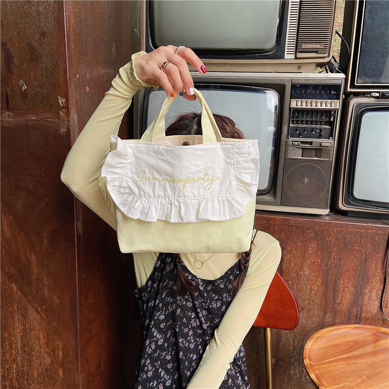 1441 Japanese and Korean chic Sweet ruffled bento Bag, Fresh embroidered hand-held small cloth bag, girl student bag wholesale undefined