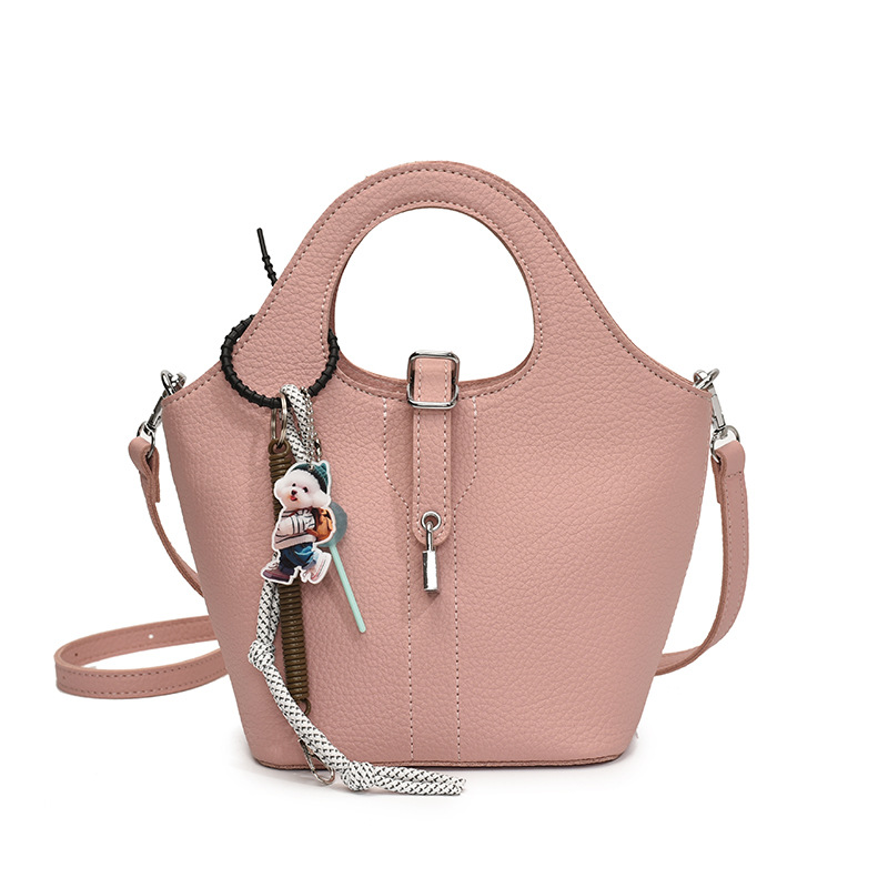 Comercio exterior explosivo bolso de cubo de mano 2025 nuevo estilo de moda universal bolso de hombro de nicho diseño de alta sensación bolso de mochila