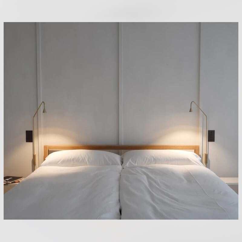Dormitorio muy creativo cabecera lámpara de cama mesa de cabecera piso simple viento moderno lámpara de pared Zhongshan led cabecera lámpara de piso norte