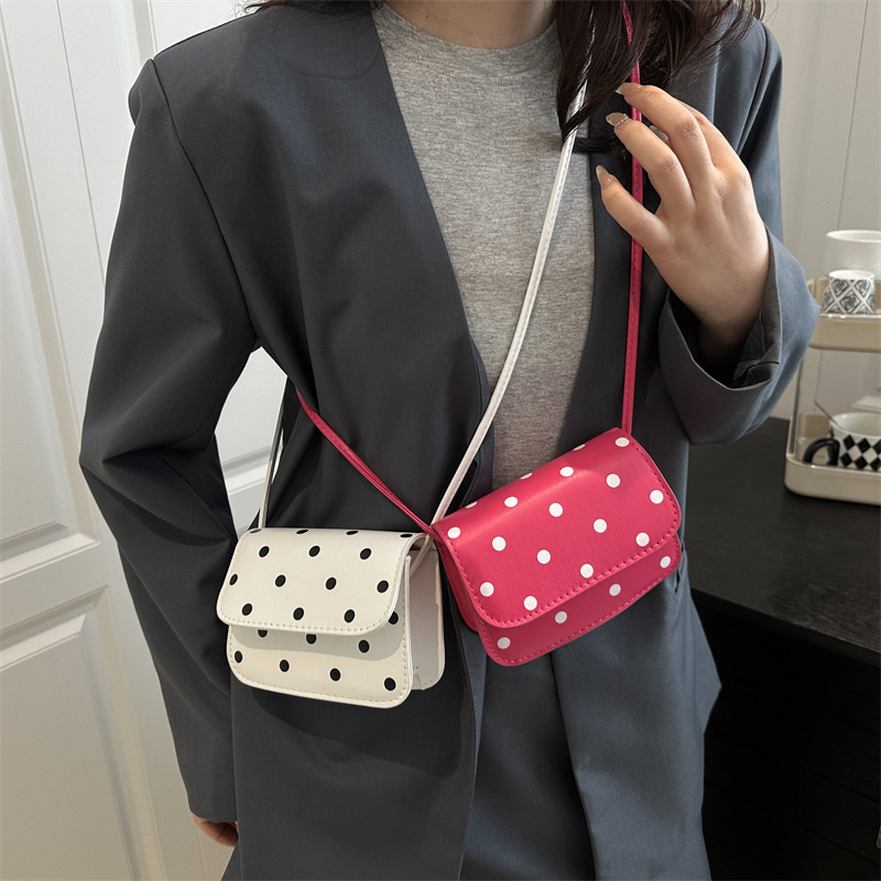 2025 primavera nuevo estilo estilo estilo extranjero simple mochila puede amar la bolsa de princesa de color ondulado punto de cambio bolsa pequeña
