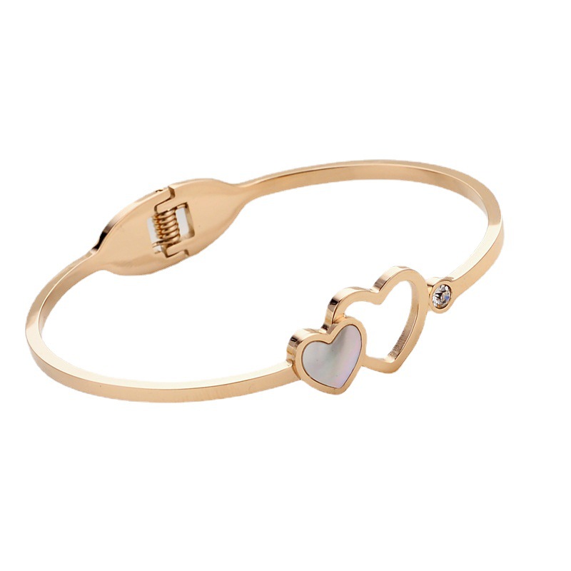 Brazaletes de titanio transfronterizos de acero, brazaletes redondos de titanio, brazaletes de amor, brazaletes de zircon, joyas de moda japonesa y coreana