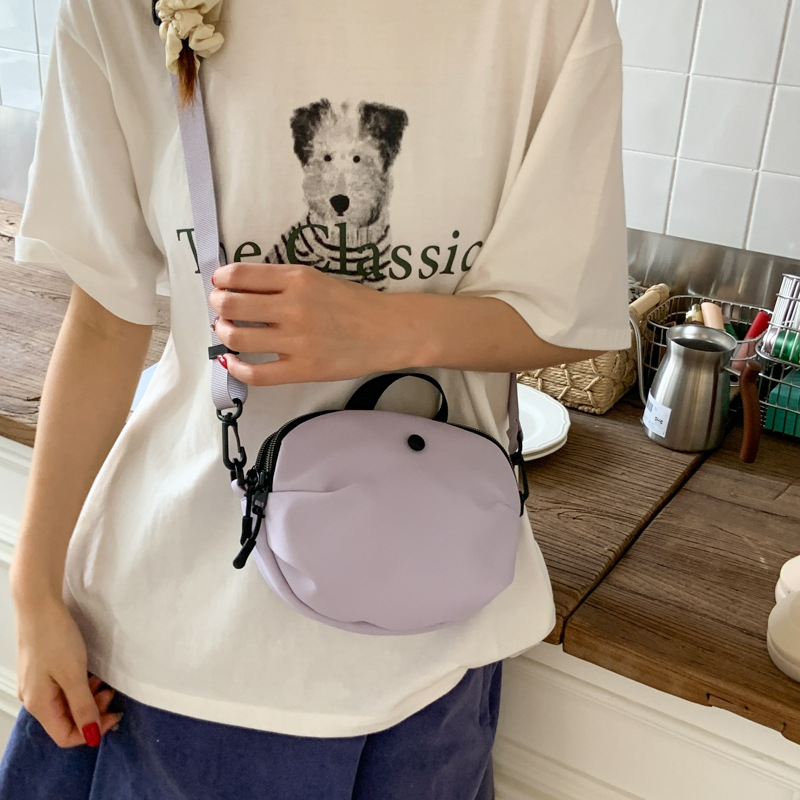Bolsos pequeños de moda coreana 2025 verano nuevo estilo bolso femenino bolso de lona simple bolso de hombro casual bolso de mensajero con correa de hombro ancha